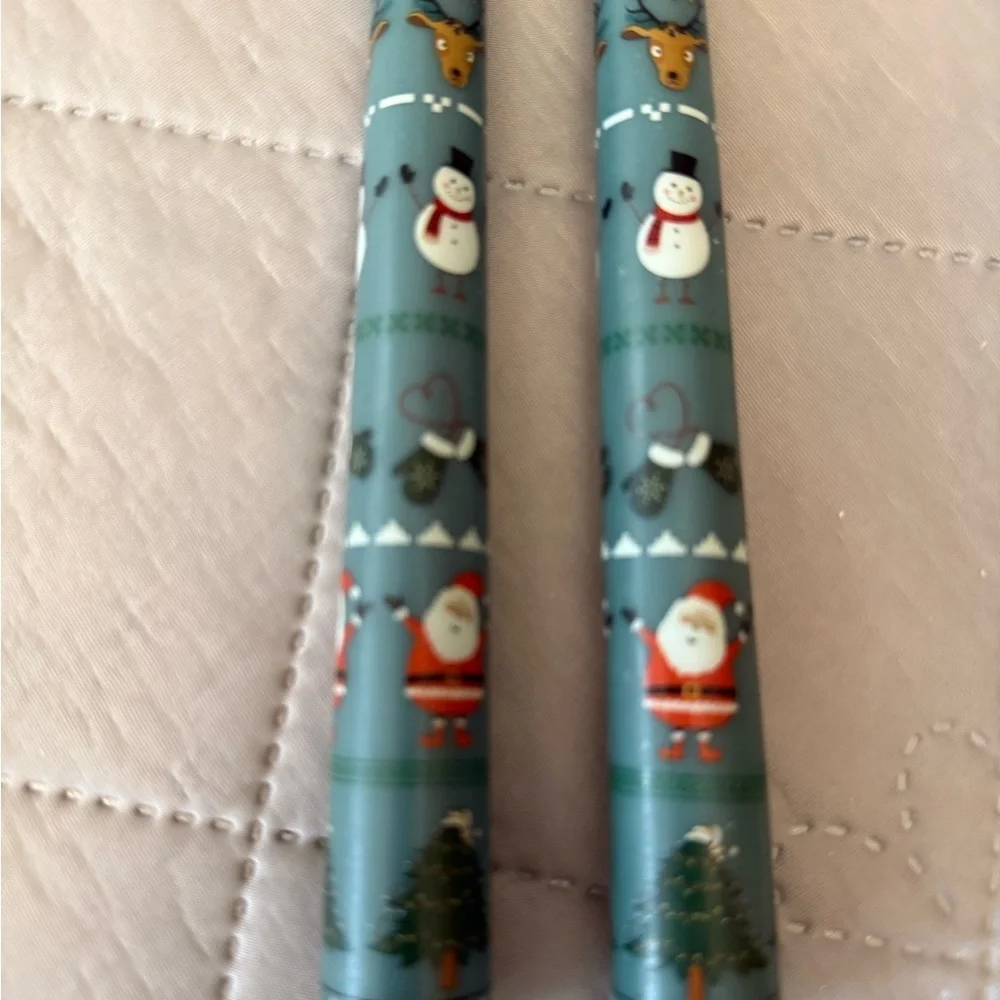 Christmas taper candles with a festive pattern, green 10”